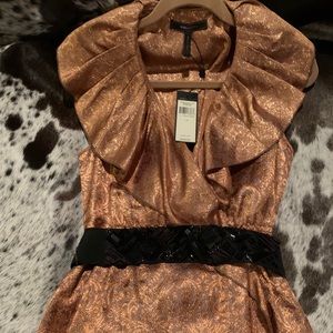 BCBG brand new designer top quality top with Built.